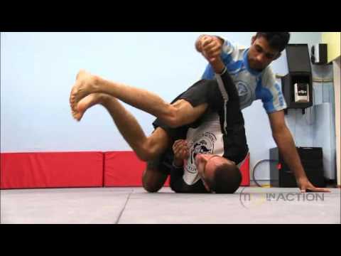 Marcelo Garcia In Action - Hip Roll Escape vs Side Control