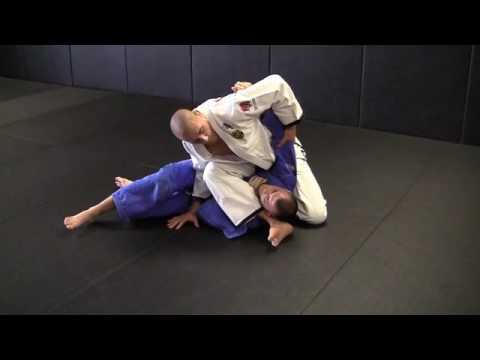 Rafael Lovato Jr. shows a triangle from side control