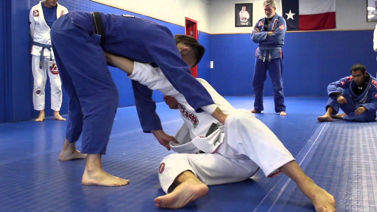 Knee on belly escape:  Stiff arm to ankle pick sweep