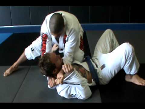 Galvao Runs through a lapel choke from side control