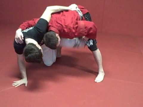 Sambo Ankle Pick to Rolling Kneebar (2008)