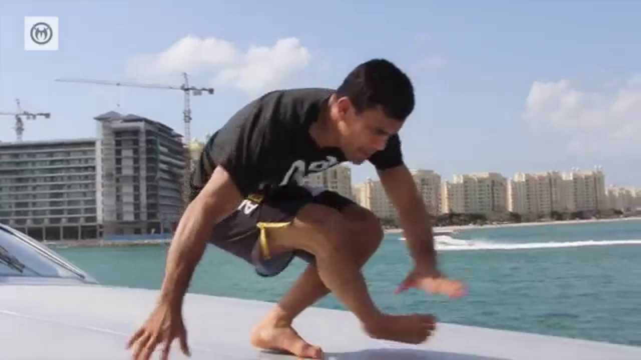 Rubens "Cobrinha" Charles works on his balance and flexibility on a Yacht Team Nogueira Dubai TV