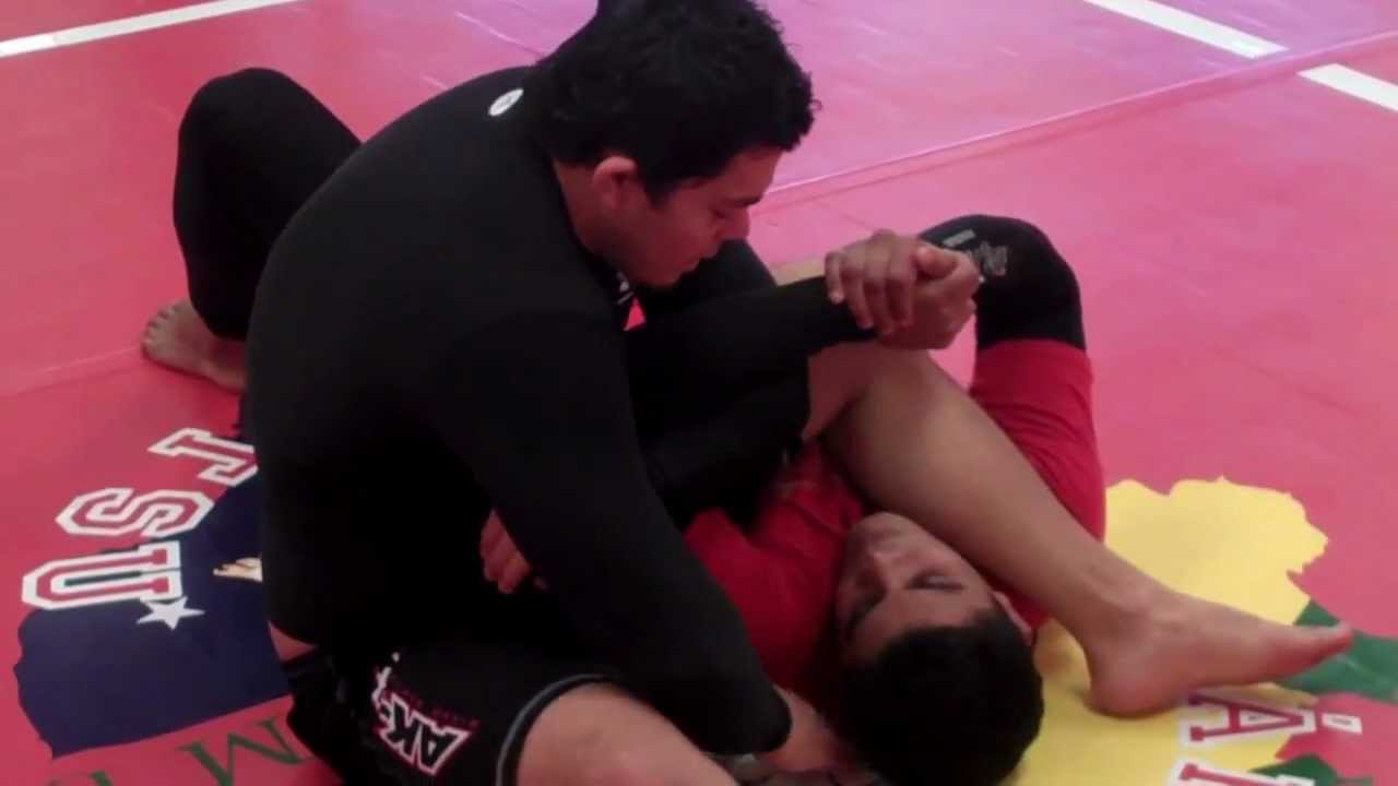 Brazilian Jiu Jitsu Technique - Arm Bar to Triangle