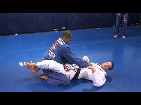 Triangle choke set up from closed guard using belt control