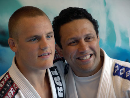Gunnar Nelson (left) posing with mentor Renzo Gracie 